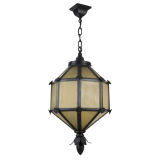 A black enamel and amber glass lantern