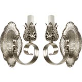 A pair of single arm silverplate sconces