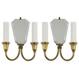 Vintage A pair of two arm brass mirrorback sconces