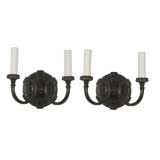 A pair of dark bronze two arm Caldwell sconces