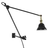 An O.C. White adjustable arm machinist lamp