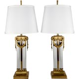 A pair of gilt double glass column table lamps