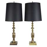 A pair of brass table lamps