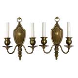 Antique A pair of two arm sconces by Bradley & Hubbard