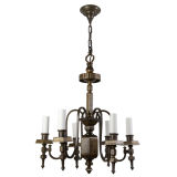 A dark bronze six-light chandelier