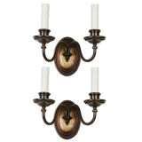 A pair of beaded sconces by the maker E.F. Caldwell