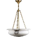 An inverted alabaster dome chandelier