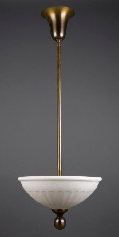 A cast glass inverted dome chandelier