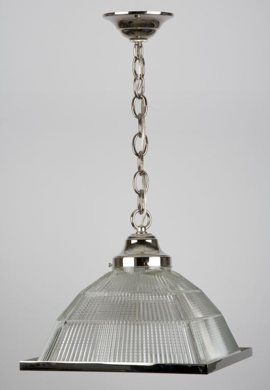 A pyramidal holophane glass pendant