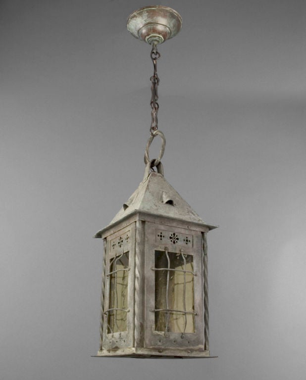 Verdigris brass lantern with pale yellow glass