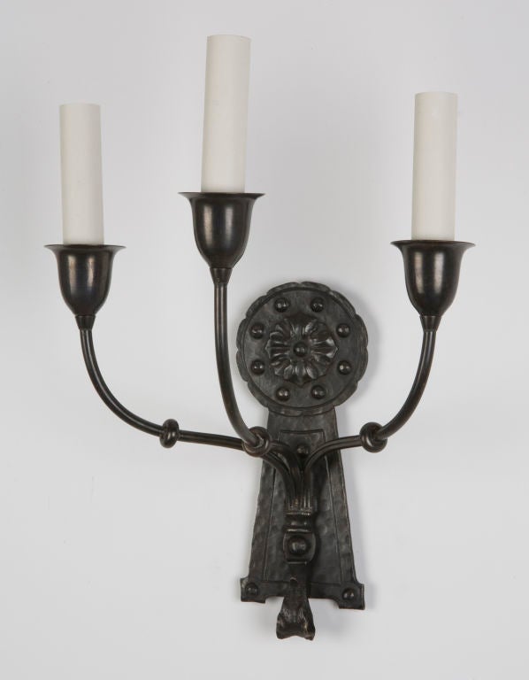 A three arm bronze sconce