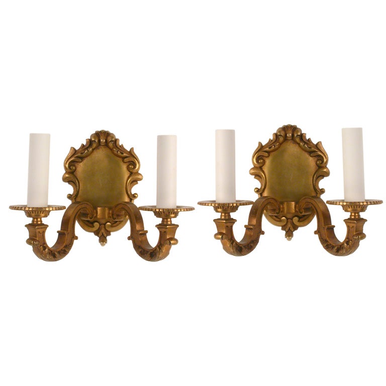 A pair of bronze baroque sconces