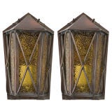 A pair of age darkened brass exterior sconces