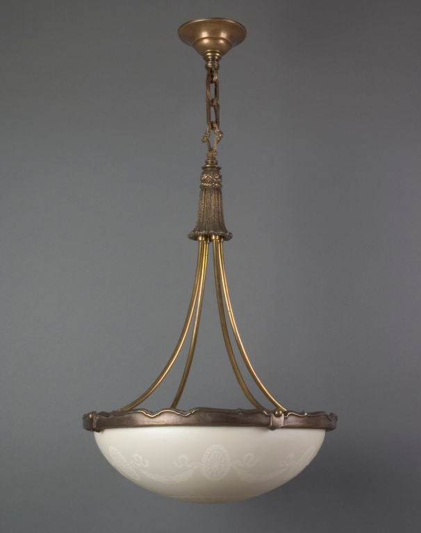 HL2415<br />
An inverted dome chandelier having an acid etched Stuben glass lens set in a dark brass finished cast metal ring.<br />
<br />
Minimum height: 30-1/2