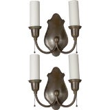 A pair of shield-back sconces by Bradley 
Hubbard