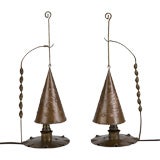 A pair of copper table lamps