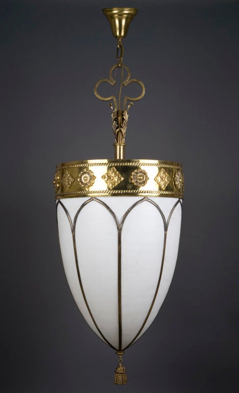 A large brass lantern with leaded glass panels
