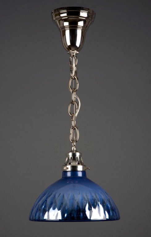 HL3411<br />
A large quilted blue mercury glass pendant on nickel hardware. The hardware for this fixture is made by the Remains Lighting Workshops.<br />
<br />
Current Height:45-1/4
