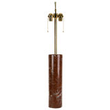 A single red marble column lamp