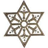 A cast brass star grille