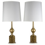 A pair of brass table lamps