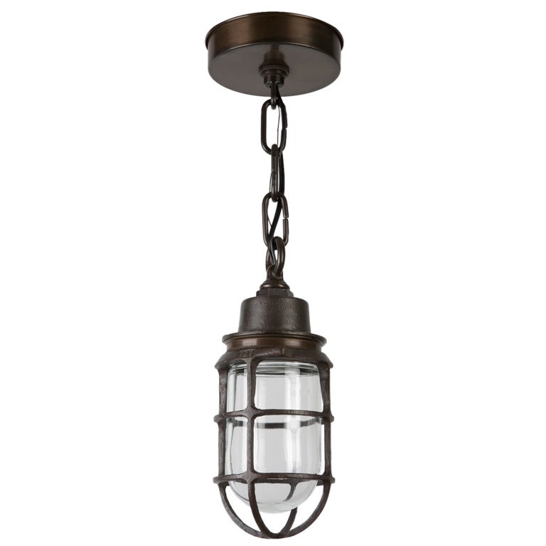 A caged pendant fixture by the maker Russell Stoll