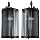 A pair of ribbed glass painted sconces
