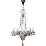 An eight arm crystal chandelier