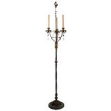Antique A cast and wrought bronze floor lamp