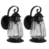 A pair of lobed glass exterior wall lanterns