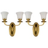 A pair of two-arm sconces