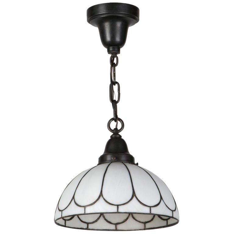 An antique leaded glass pendant