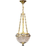A petite antique crystal basket chandelier