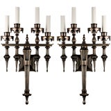 A pair of Antique nickeled bronze and iron four light sconces