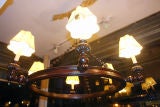 Carved Mahogany  "Wheel" Chandeliers