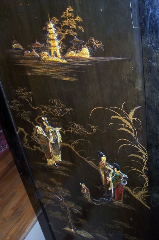A circa 1920 Chinese cabinet with stone insets. The landscapes on all 3 sides depicting court scenes. A matching bar also available.<br />
At our showroom at 241 East 60th Street, NY, NY  212-751-2282