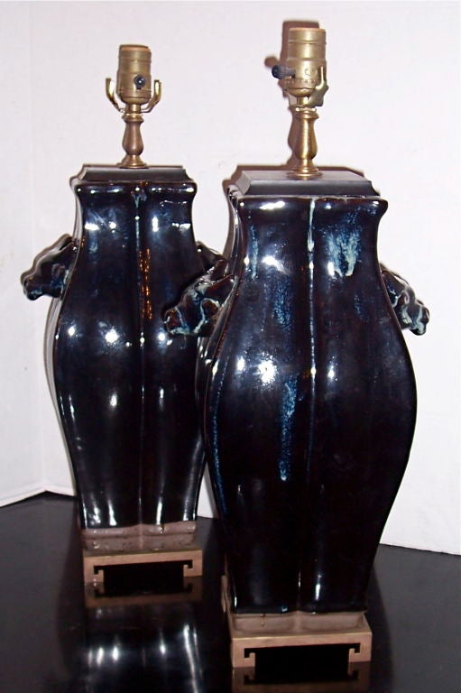 Pair of circa 1940's Italian dark blue table lamps with drip glazing on body.

Measurements
Height of body: 18