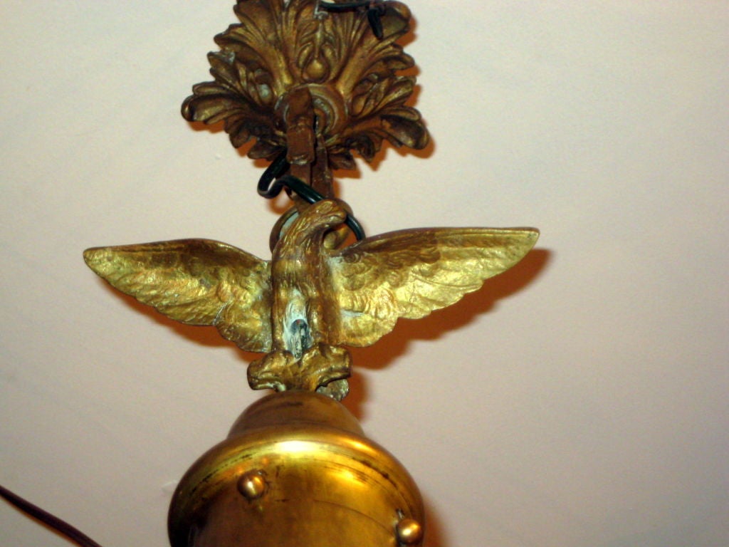Molded glass lantern with eagle motif
