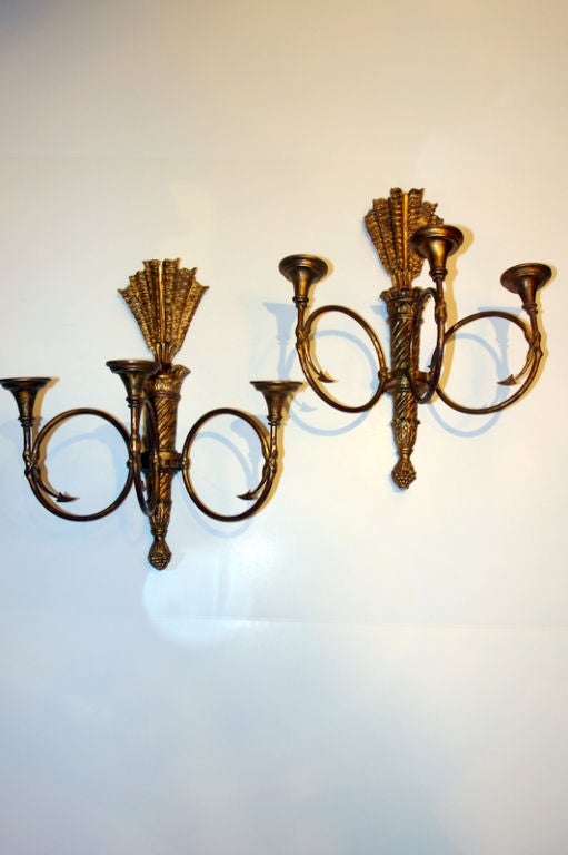 A pair of circa 1920's Italian carved and gilt wood sconces with lights.

Measurements:
Height 15