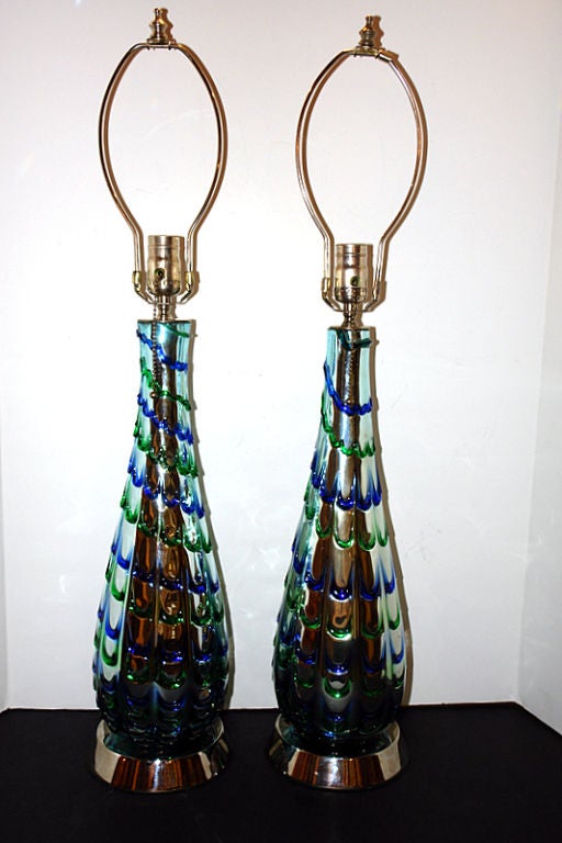 Pair of circa 1940's Italian hand blown mercury glass lamps with green and blue highlights.

Measurements:
Height of body: 19