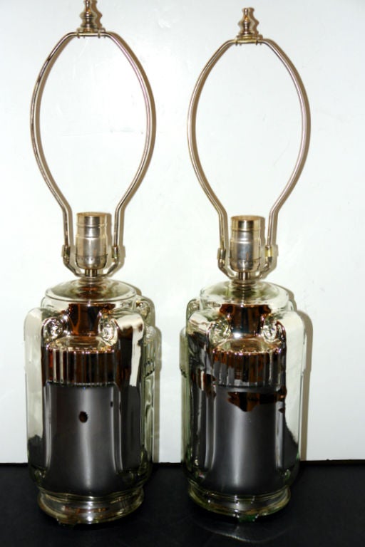 Pair of 1930s French molded mercury glass table lamps.
Measurements:
Height of body: 10