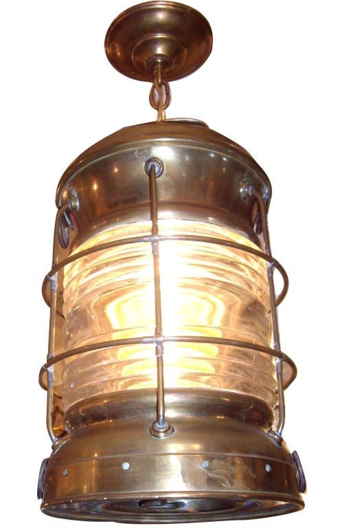 A set of three circa 1920's English brass lantern with molded glass. Sold individually.

Measurements:
Height: 23