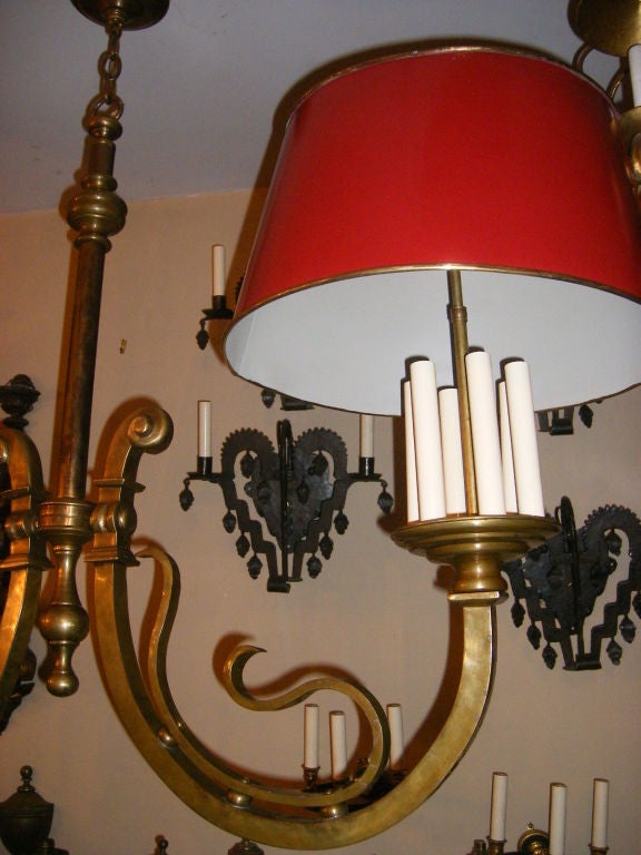 A patinated bronze billiard light fixture with painted tole shades.  12 lights. <br />
48