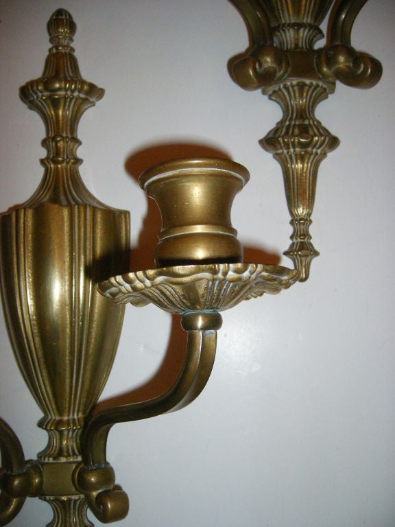 A set of circa 1920's French bronze two-arm sconces with original patina.

Measurements:
Height: 16
