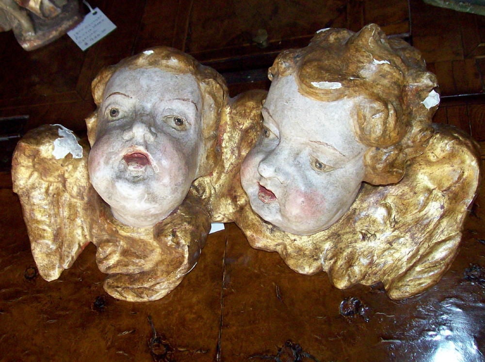 EUROPEAN CARVED PUTTI