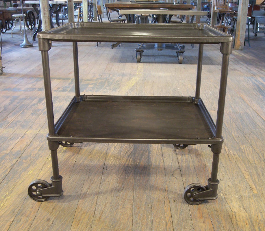 Vintage Industrial Two Tier Cart on Casters. Height of the Bottom Shelf is 14