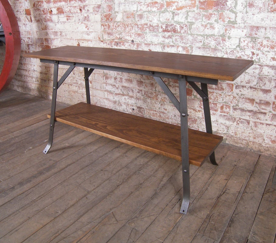 Vintage Industrial wood and steel Industrial bench or table or shelving unit. Overall dimensions are 48