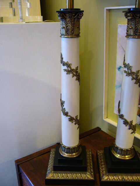 SOLD OCTOBER 2009   Impressive French Empire style Neoclassical Column Table Lamps by Stiffel.  Fine details, chasing on brass patinated Corinthian capital and lotus leaf column socle and plinth base mounts and leaf vine scrolling around column. 