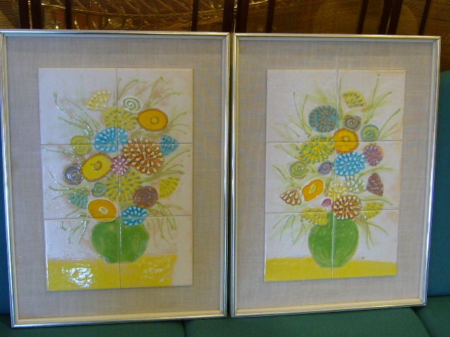SOLD JUNE 2009  A master at tile art and collage, here are two large outstanding framed Harris G. Strong glazed tile murals representing teeming with color bouquets.  Great texture and color, in their original white silver trimmed frames, mounted on