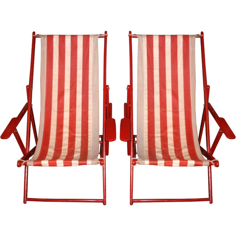 PAIR OF RED AND WHITE STRIPED CANVAS BEACH CHAIRS
